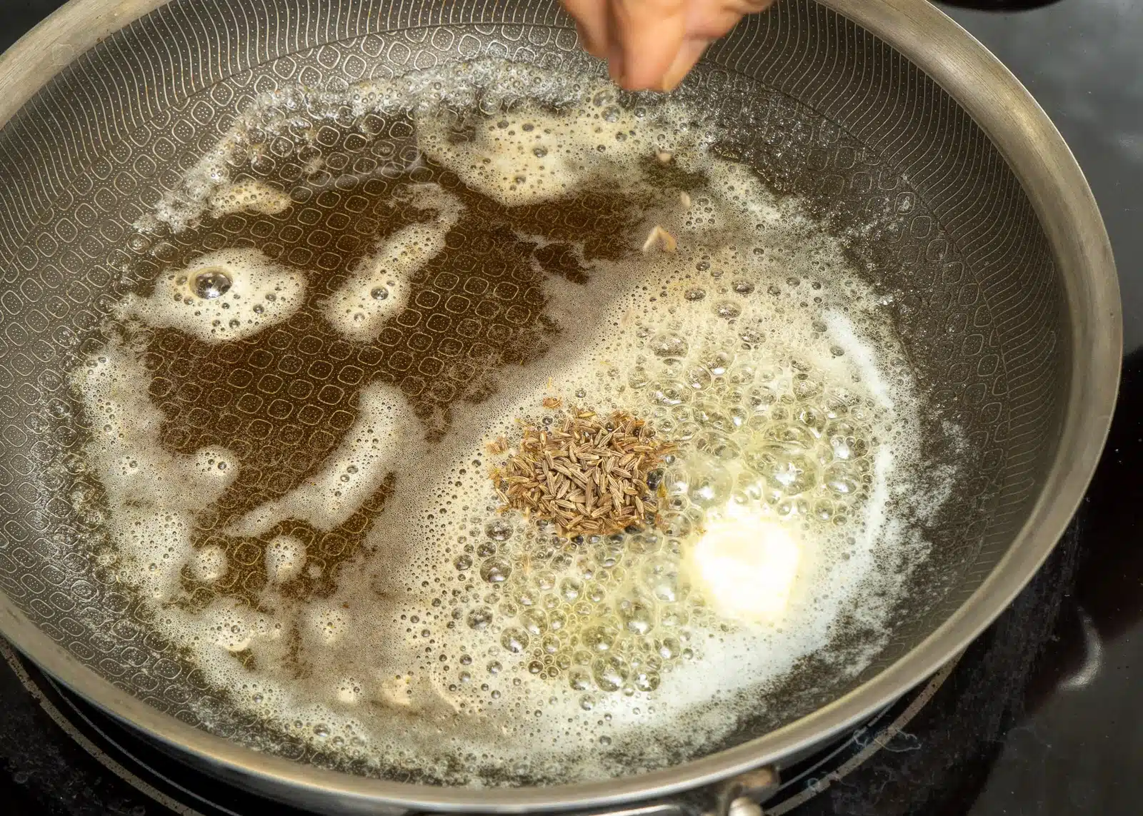 start with cumin seeds in butter
