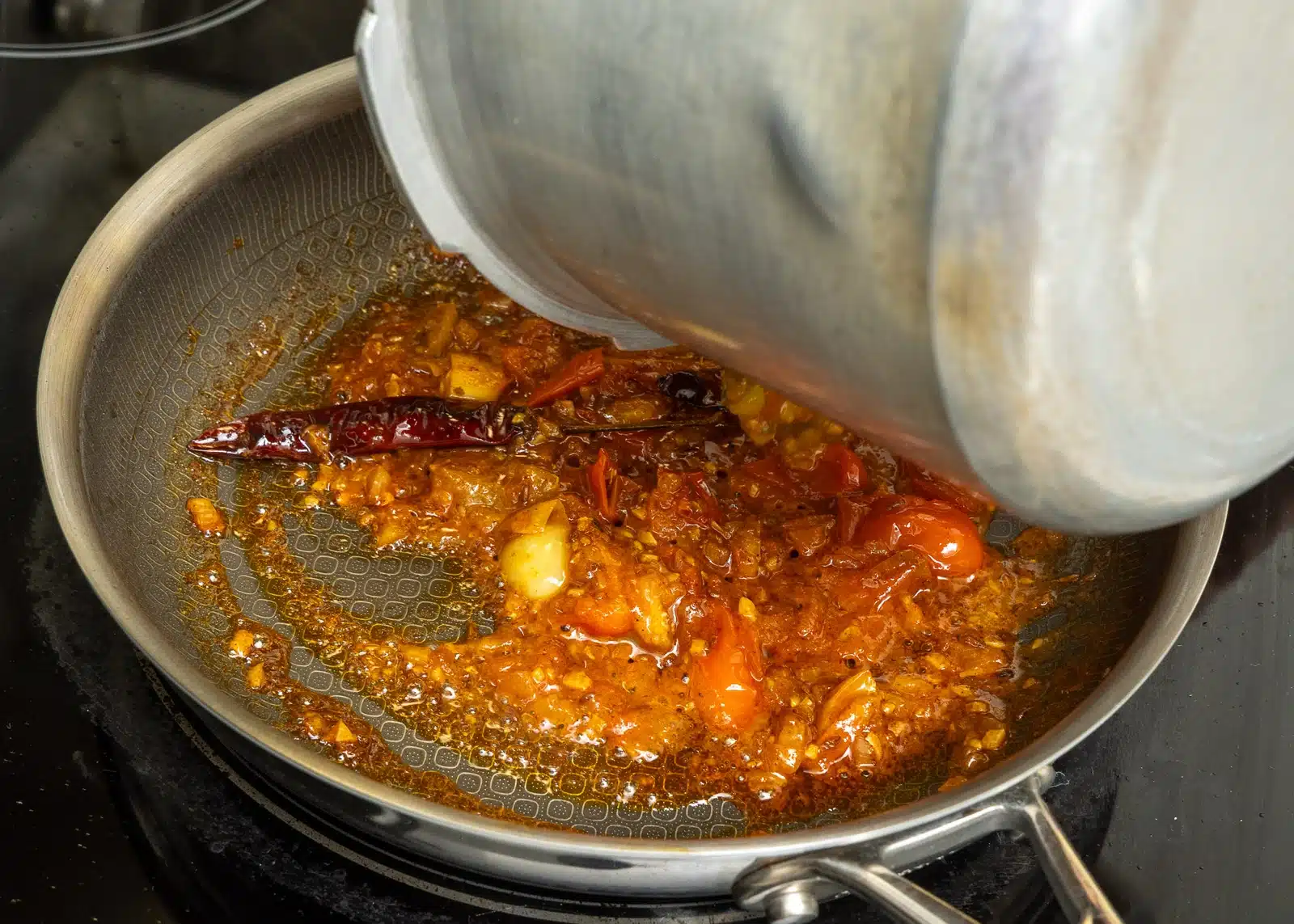 when tomato turn soft, add cooked lentil, spinach mix