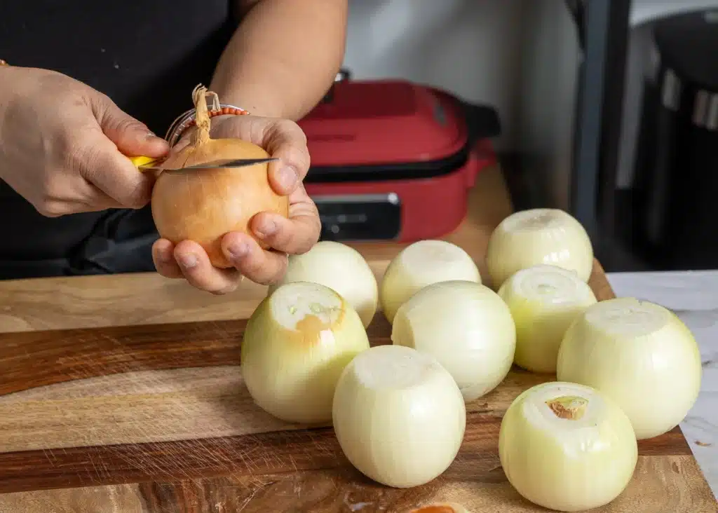 Right Way To Caramelize Onions And Store Them Peel the skins off your onions and trim away the rough ends.