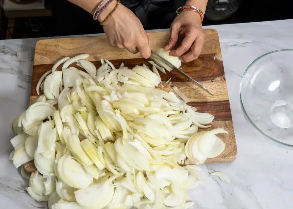 Right Way To Caramelize Onions And Store Them Cut the onions into even slices so they cook at the exact same rate.