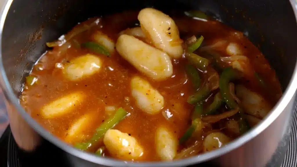 Rice Cake: Easy Sweet and Spicy Homemade Recipe add cooled dough spices