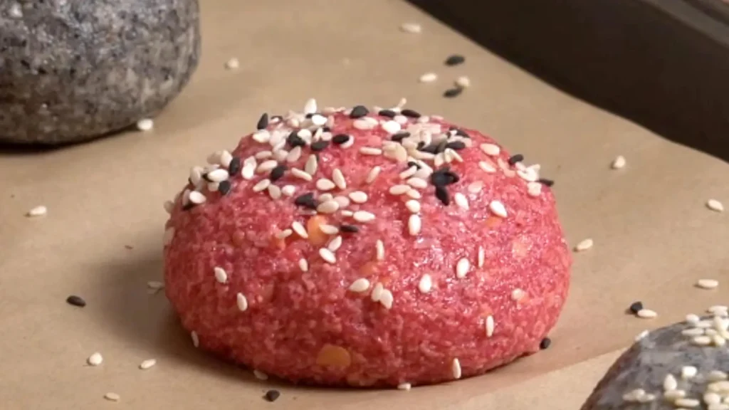 Red Lentil Bun: Soft, Colorful & No-Knead Bun brush milk & add sesame seeds