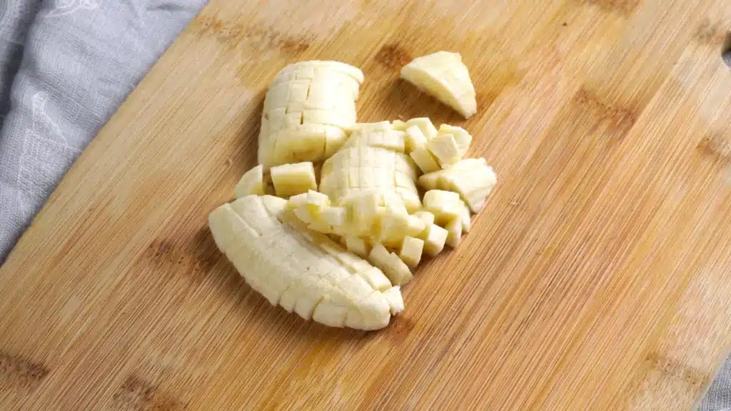 Banana Milk: Quick, Creamy & Easy Homemade Recipe chop banana into bite size pieces