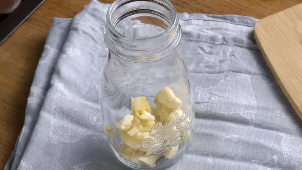 Banana Milk: Quick, Creamy & Easy Homemade Recipe chopped banana in glass