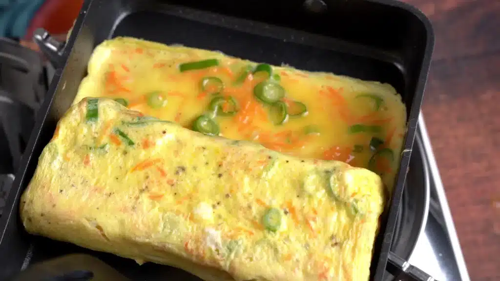 Tamagoyaki - Rolled Omelette In Easy Steps (With Video) continue adding layers
