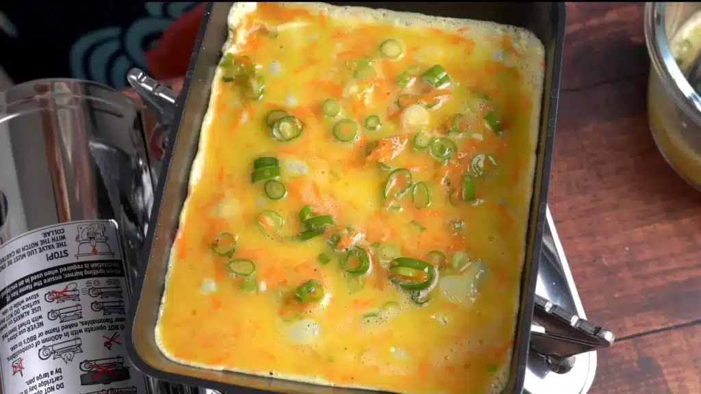 Tamagoyaki - Rolled Omelette In Easy Steps (With Video) cook until egg is slightly firm