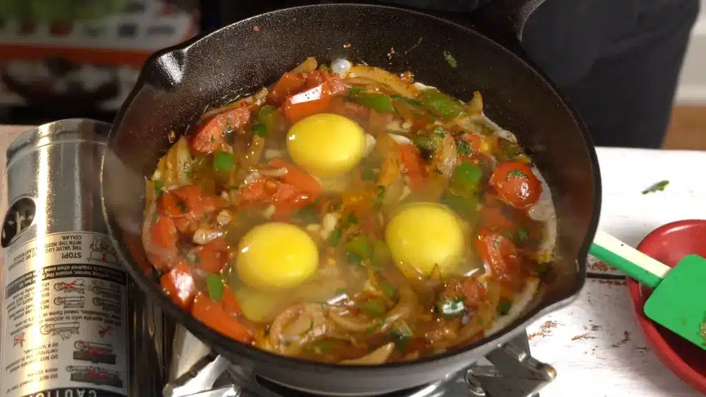 Afghani Omelette crack the eggs