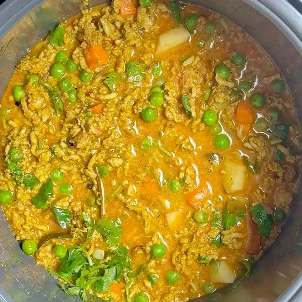 Chicken Keema: Simple & Delicious Slow Cooker Recipe mix everything & add stock, veggies