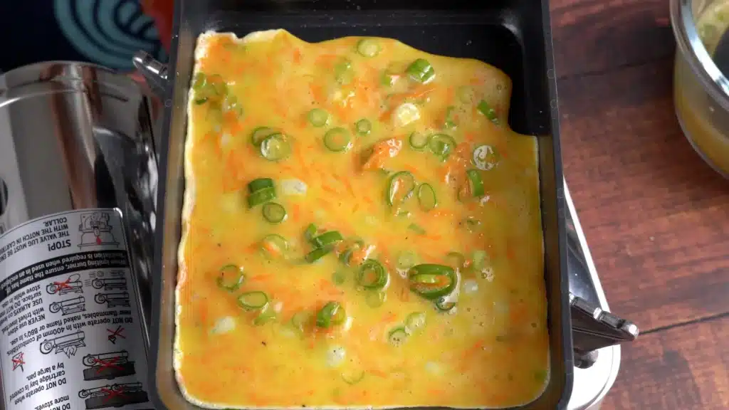 Tamagoyaki - Rolled Omelette In Easy Steps (With Video) pour thin layer of egg mix