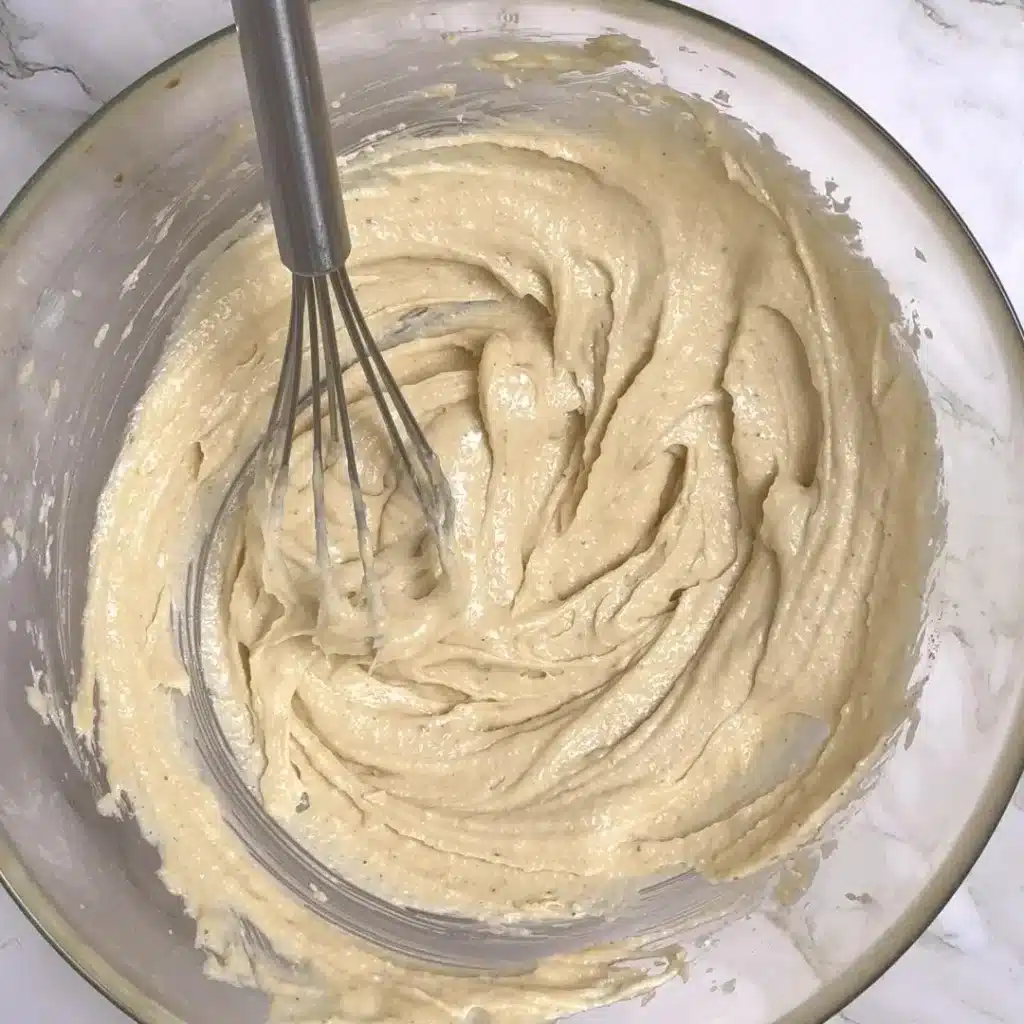 Best Coconut Tea Biscuits for Your Next Cup of Tea beat mixture until becomes creamy