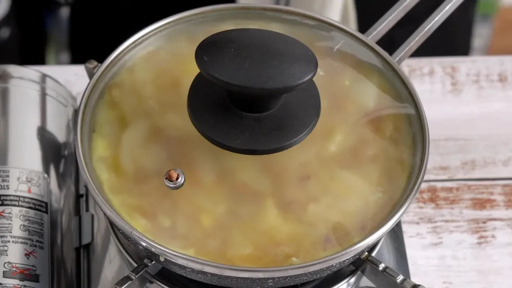 Fluffy, Golden & So Good – Spanish Omelette add mixture in pan , cover and cook 2