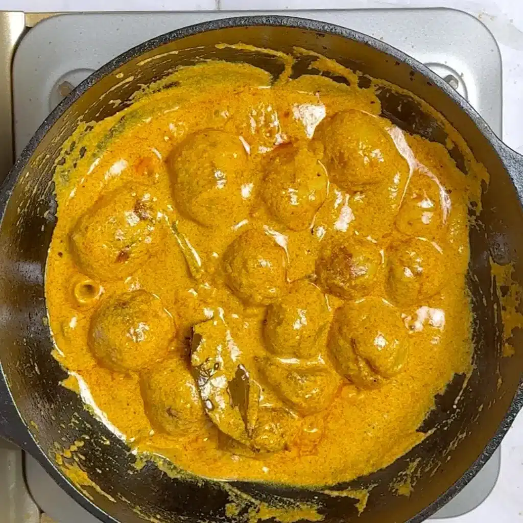 Kashmiri Dum Aloo Recipe: A Rich and Flavourful Indian Curry cook for 5-6 mins , add fried potatoes