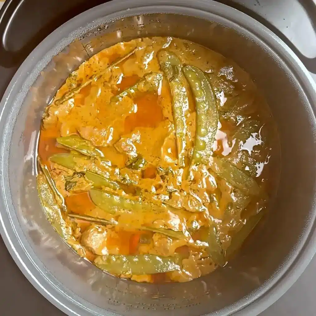 Easy & Creamy Crockpot Thai Chicken Curry finish with squeeze of lime and serve