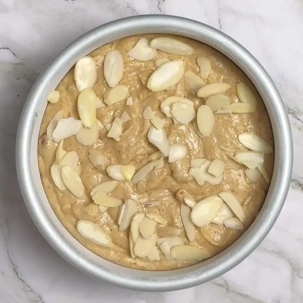 Simple Eggless Walnut Cake for Tea Time for more crunch, add more wlanut on top , bake at 350F