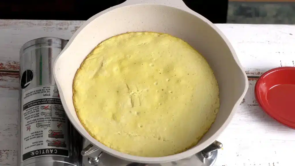 Vegan Omelette (egg free) pour batter in pan