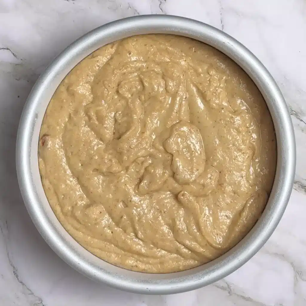 Simple Eggless Walnut Cake for Tea Time pour the mix into 6 inch cake pan
