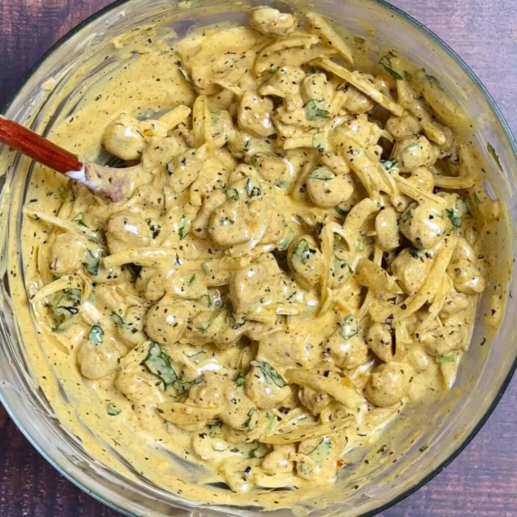 Try This Creamy, Tangy and Spicy Soya Chukauni add sliced onion, roasted soya chunks to yogurt, mix everything well