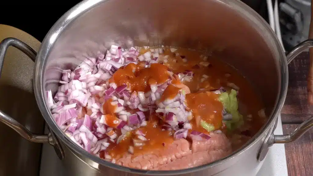Chicken Mince & Peas: Simple and Full of Flavor in a pot, add oil chicken, onion ginger garlic