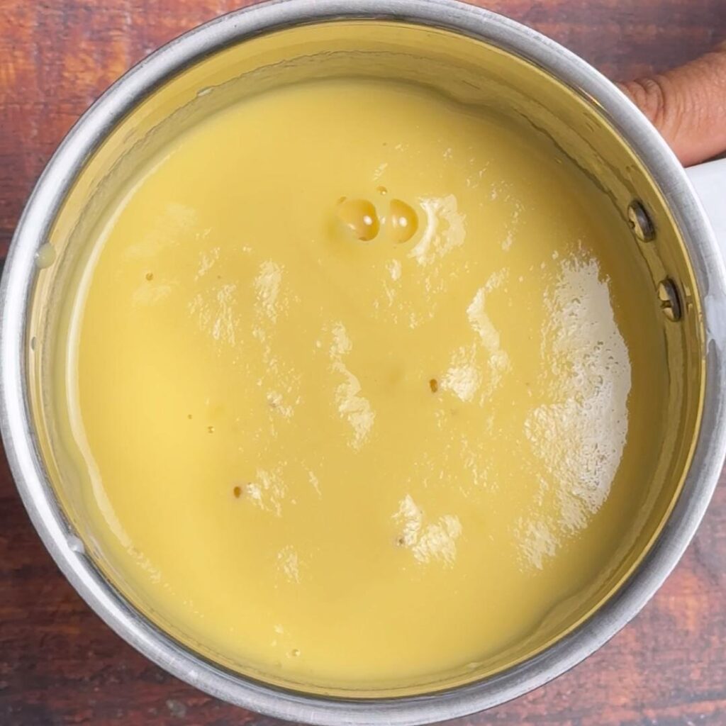 In a blender add soaked yellow lentils, ginger...