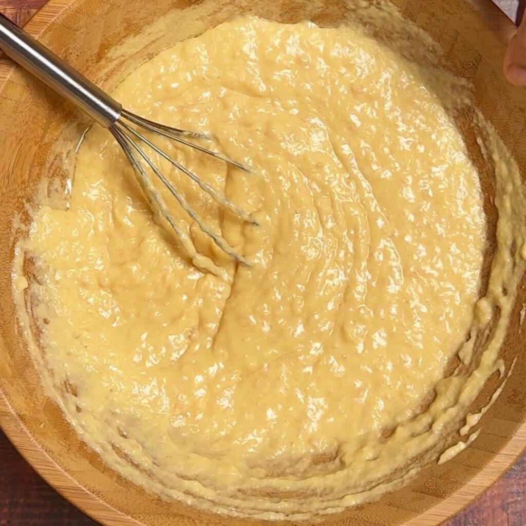 In a bowl add minced chicken, lentil batter and olive oil, Mix well