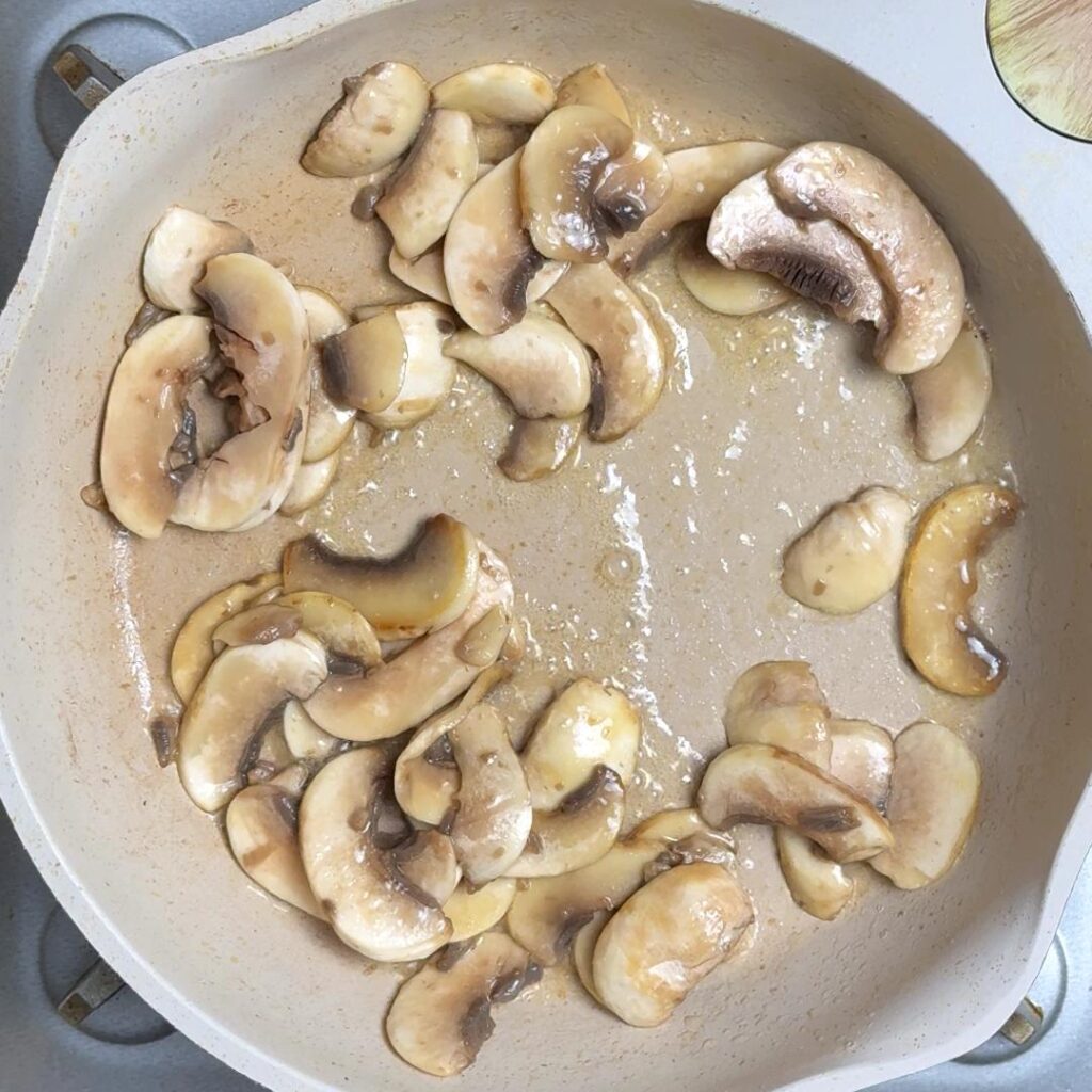 In a pan melt the butter then add the mushrooms and cook until slightly soft.