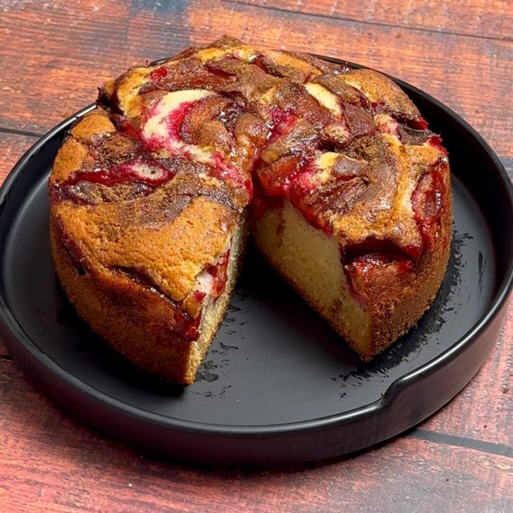 Easy Peasy Plum Cake with Fresh Plums Let it cool for at least 10–15 minutes then remove it