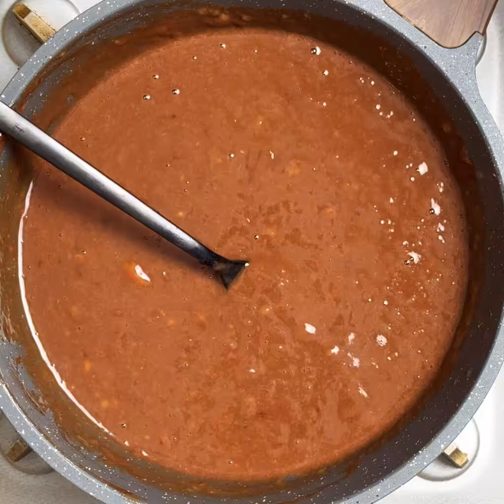 Now add eggs and mix well with the banana then add hazelnut spread